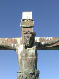 Low angle view of built structure against clear blue sky