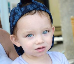 Portrait of cute baby boy wearing cap 
