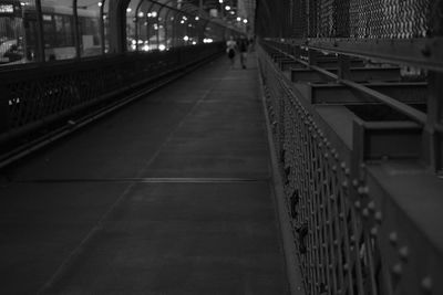 Man walking on footbridge