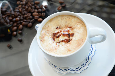 High angle view of coffee cup on table