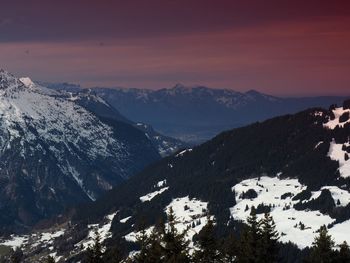 Scenic view of mountains against sky during sunset