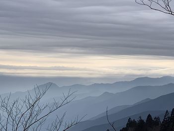 Scenic view of mountains against sky during sunset