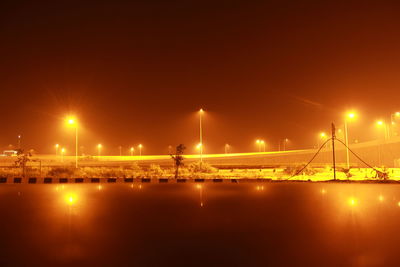 Reflection of illuminated buildings in water