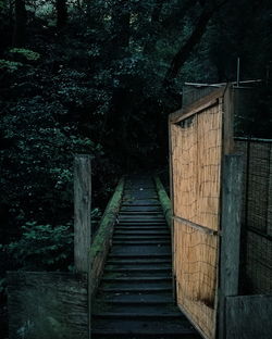 Wooden footbridge in forest