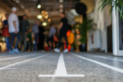 Surface level of people on street in city