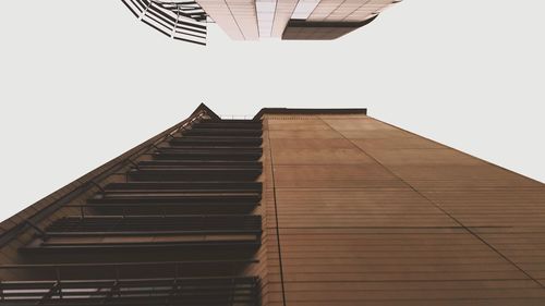 Low angle view of modern building against clear sky