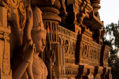 Low angle view of statues at temple