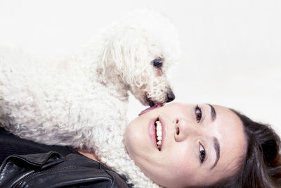 Portrait of smiling woman with dog