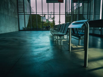 Empty chairs and table in office