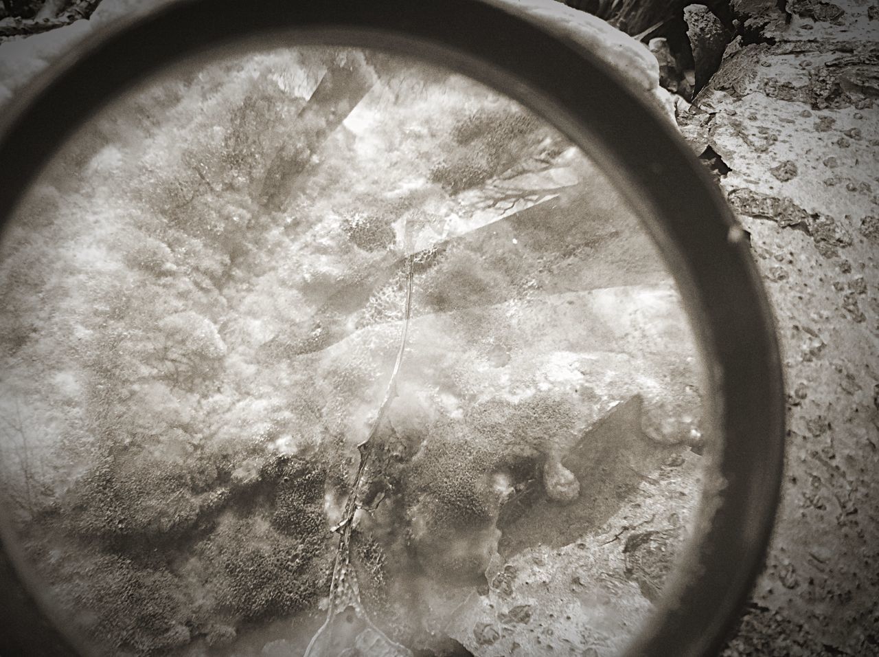 close-up, circle, high angle view, part of, indoors, day, no people, directly above, reflection, water, cropped, wet, metal, nature, fish-eye lens, transportation, tire, shape, dirty