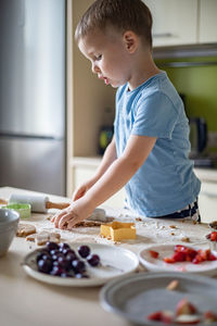 Boy preparing food at home