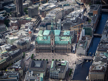 Aerial view of hamburg town hall by alster river