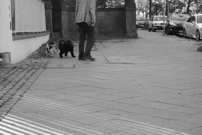 Full length of woman standing on tiled floor