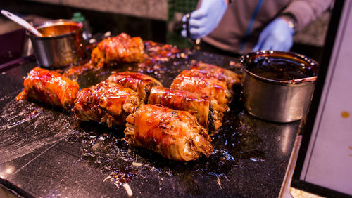 Close-up of meat on barbecue grill