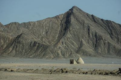 Scenic view of desert against clear sky