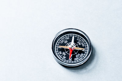 High angle view of bicycle wheel against white background