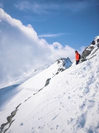 Scenic view of snow covered mountains against sky