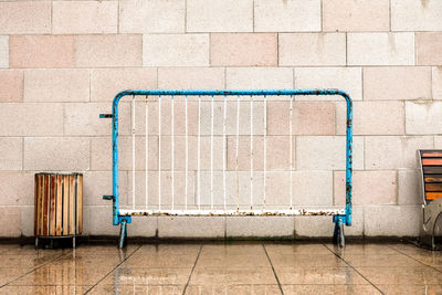 Empty tiled floor against wall