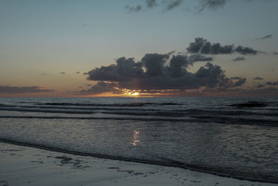 Scenic view of sunset over sea