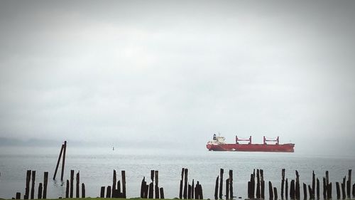 Ship in sea against sky