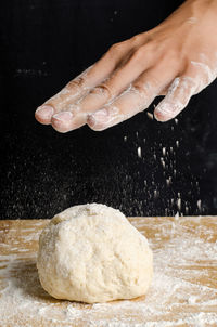 Close-up of woman preparing food