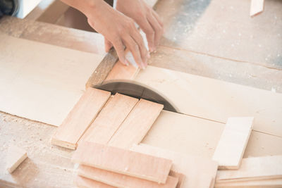 Close-up of man working on wood