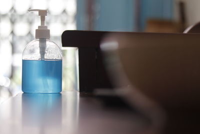 Close-up of bottle on table