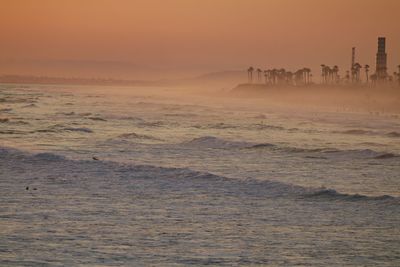 Scenic view of sea against sky during sunset