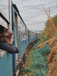 Watching the views go by on the scenic train ride 