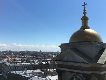 High angle view of city buildings against sky