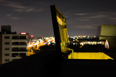 Buildings in city at night