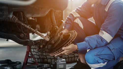 Man working in car