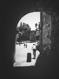 View of people walking on tiled floor