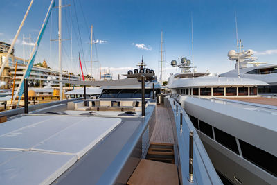 Boats moored at harbor