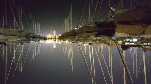 Reflection of illuminated buildings in water