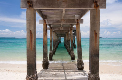 Pier over sea against sky