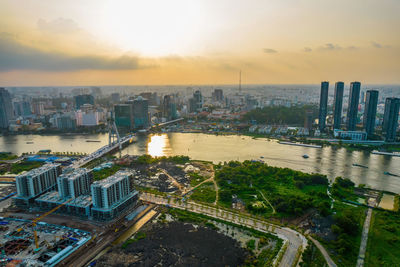 High angle view of buildings against sky during sunset