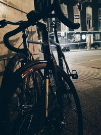 Close-up of bicycle parked on street