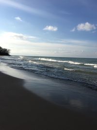 Scenic view of beach against sky