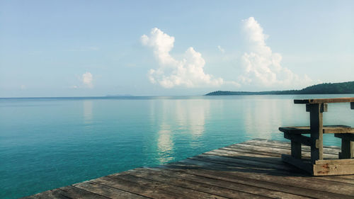 Pier over sea against sky