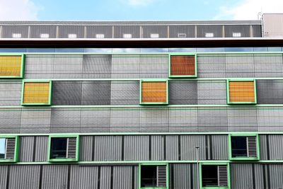 Low angle view of modern building against sky