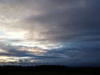 Scenic view of dramatic sky during sunset