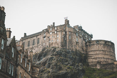 Low angle view of historic building against clear sky