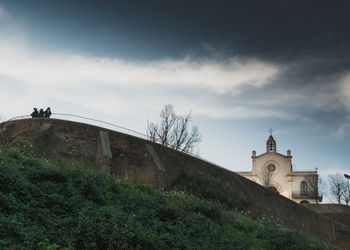 Low angle view of historic building against sky