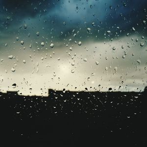 Close-up of raindrops on window