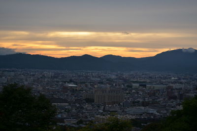 High angle view of townscape against sky during sunset