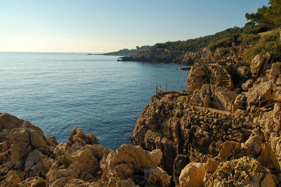 Scenic view of sea against clear sky