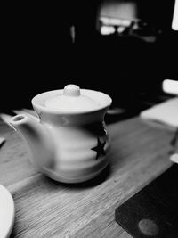 Close-up of coffee cup on table