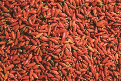 Full frame shot of red chili peppers for sale at market stall