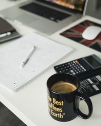 Close-up of coffee cup on table